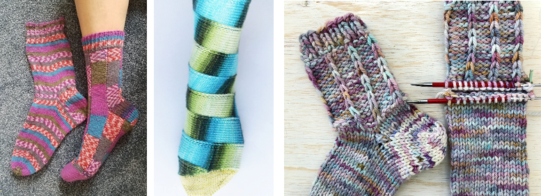 Three different sock designs. On the left, there are two socks juxtaposed, both knit in the same orange, purple, and brown variegated yarn. The first sock is knit with dense stripes of colours. The second sock appears to have large patchwork blocks of each colour instead. In the middle is a sock that made of blue and green yarn, where the stripes of knitting resemble a ribbon wrapped around a foot starting from the toe and going up. On the right is a completed sock and a partially-worked sock, showing that this sock is made by first knitting a tube and then knitting in a heel afterwards.